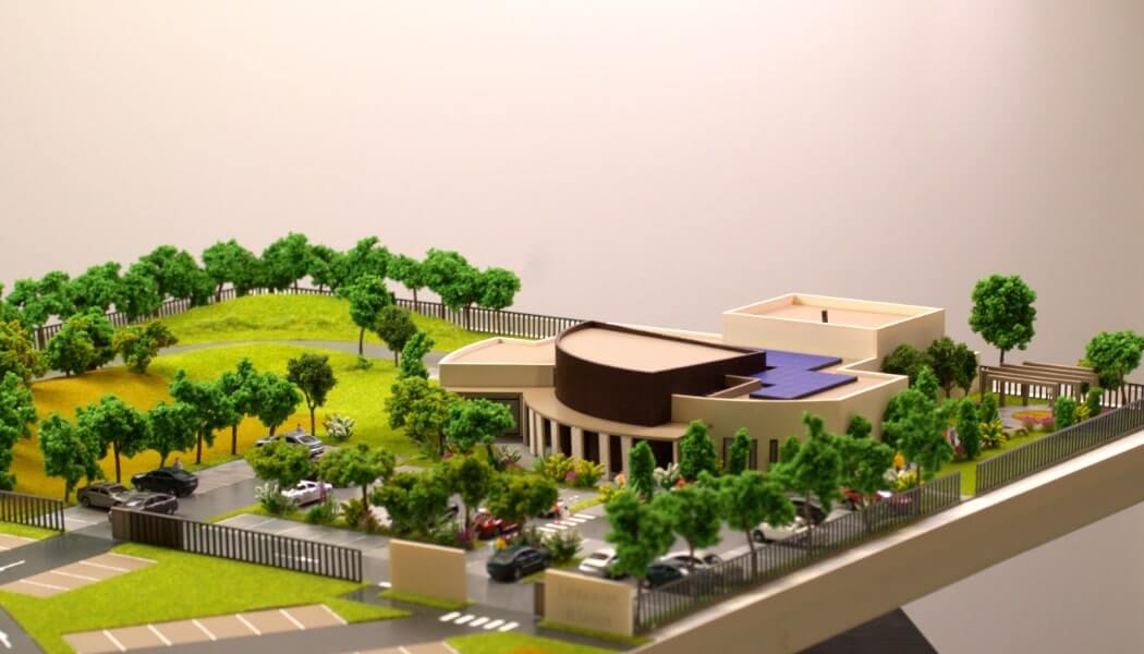 miniature building with solar panels miniature building with solar panels